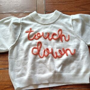 White Sweater with Orange 'Touch Down' Design